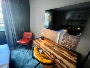 TV a/nebo společenská místnost v ubytování Hotell Siesta