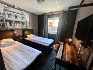 Postel nebo postele na pokoji v ubytování Hotell Siesta