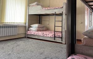 Postel nebo postele na pokoji v ubytování The Nest Hostel
