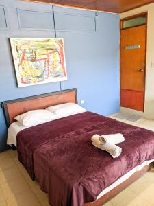 The Spot Hostel León房間的床