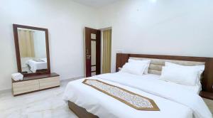 Hotel Basundhara客房内的一张或多张床位