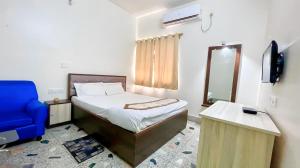 Hotel Basundhara客房内的一张或多张床位