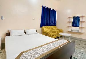 Hotel Basundhara客房内的一张或多张床位