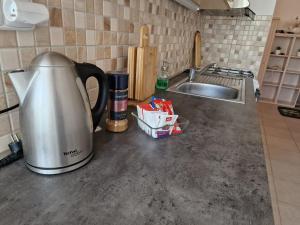 Kuchyň nebo kuchyňský kout v ubytování Apartmán U Petra