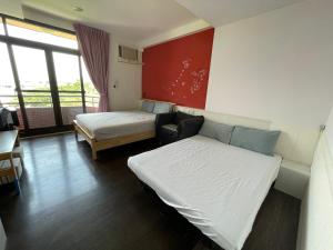 Letto o letti in una camera di HeMei Homestay