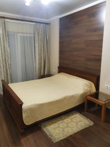 Кровать или кровати в номере Lutsk, Double-Room apartments