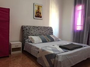 a bedroom with a bed in a room at Home JV in Getafe