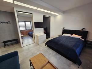 Ένα ή περισσότερα κρεβάτια σε δωμάτιο στο Karpacka 8 +38 φωτογραφίες