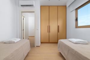 Postel nebo postele na pokoji v ubytování The 12th City Hotel + 37 fotografií