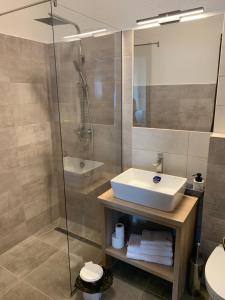 Koupelna v ubytování Casa Leda + 10 fotografií