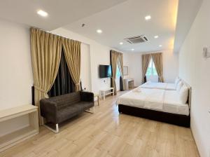 Postel nebo postele na pokoji v ubytování Vvip Hotel