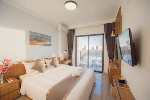 TV a/nebo společenská místnost v ubytování M9 Kirirom Hotel
