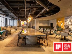 a dining room with a large table and chairs at Prince Smart Inn Kyoto Sanjo in Kyoto