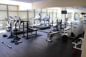 a gym with several treadmills and other equipment at Sea View Private Studio Paradiso B 508 in Nesebar