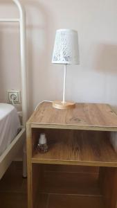 A bed or beds in a room at Xristina's Experience