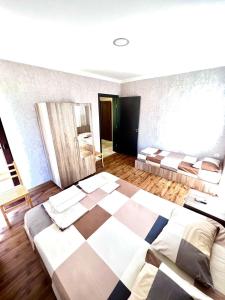 Voodi või voodid majutusasutuse Rio cottage apartment toas