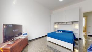 Giường trong phòng chung tại House Azzurra by Holiday World