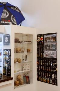 a display case in a store with many items at Hostel Franz Kafka in Prague