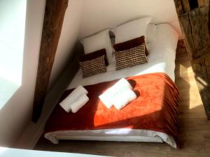 Postel nebo postele na pokoji v ubytování Loft Cosy et atypique + 5 fotografií