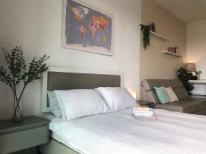 Posteľ alebo postele v izbe v ubytovaní May's Place @ Evo Soho Suites