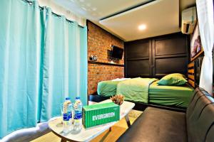 TV a/nebo společenská místnost v ubytování 99/9 Box Resort