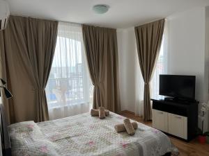 Postel nebo postele na pokoji v ubytování Antorini Apartments + 67 fotografií