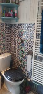 Ванная комната в Chambre dans maison mosaïquée