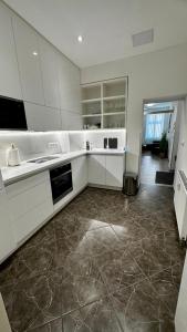 Kuchyň nebo kuchyňský kout v ubytování hbclinic apartment
