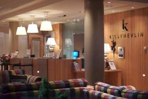 a lobby with couches and a waiting room at Killyhevlin Lakeside Hotel & Lodges in Enniskillen +63 photos