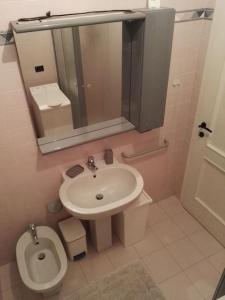 Ванная комната в La casetta rosa