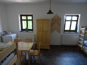 Postel nebo postele na pokoji v ubytování Penzion U vlka
