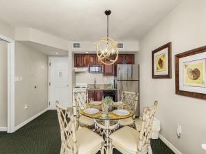 a dining room with a table and chairs at Lovers Key Resort 503 - Fort Myers in Fort Myers Beach