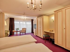Ein Bett oder Betten in einem Zimmer der Unterkunft Hotel Reppert