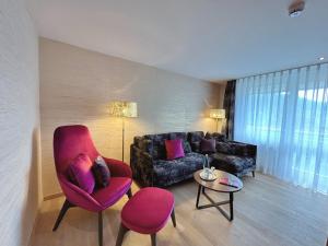 Ein Sitzbereich in der Unterkunft Hotel Reppert