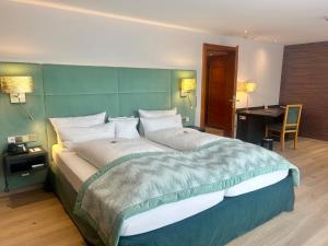 Ein Bett oder Betten in einem Zimmer der Unterkunft Hotel Reppert