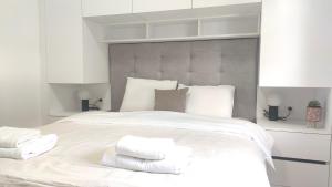 Postel nebo postele na pokoji v ubytování Apartments LORA in Bonila