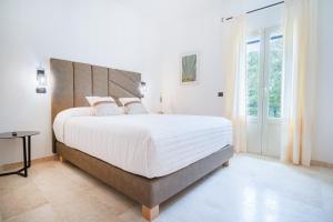 Postel nebo postele na pokoji v ubytování Paghe Eco Luxury Experience