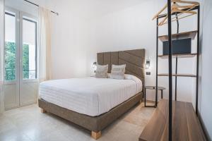 Postel nebo postele na pokoji v ubytování Paghe Eco Luxury Experience