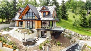 Vonkajšia záhrada v ubytovaní Salamandra Chalet Kościelisko