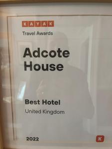 znak dla oktotide domu ze słowami najlepszy hotel w obiekcie Adcote House w mieście Llandudno