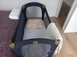 Łóżko lub łóżka w pokoju w obiekcie Apartament IGA