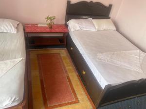 Postel nebo postele na pokoji v ubytování Himalayan Vacation Home