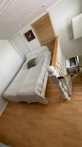Ένα ή περισσότερα κρεβάτια σε δωμάτιο στο Kaliininkuja