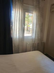 Katil atau katil-katil dalam bilik di Korais apartment, Chania Crete