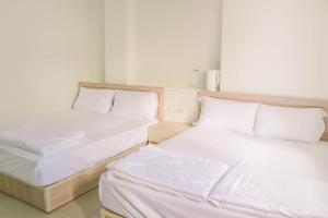 Letto o letti in una camera di TETE Homestay