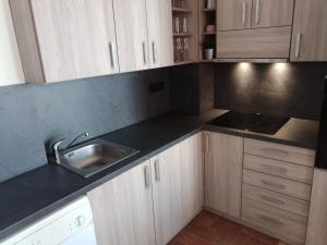 A kitchen or kitchenette at Apartmán TTT