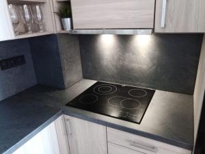 A kitchen or kitchenette at Apartmán TTT