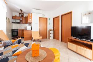Kuchyň nebo kuchyňský kout v ubytování Apartment Mara