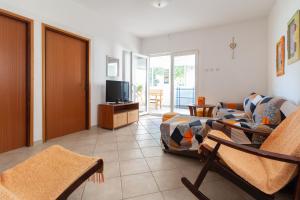 TV a/nebo společenská místnost v ubytování Apartment Mara