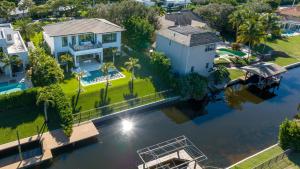 an aerial view of a house with a swimming pool at The Delray Hideaway in Delray Beach
